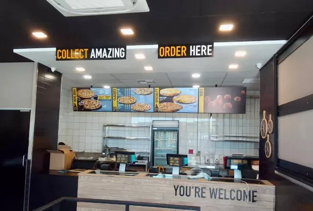 Debonairs counter signs and menu area at Pilane Mall