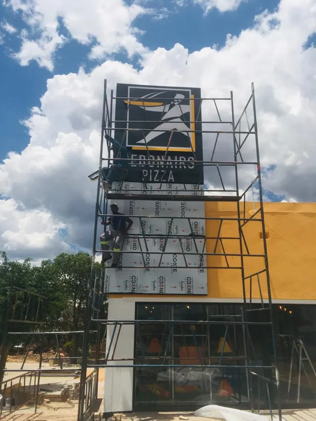 Debonairs pylon during installation