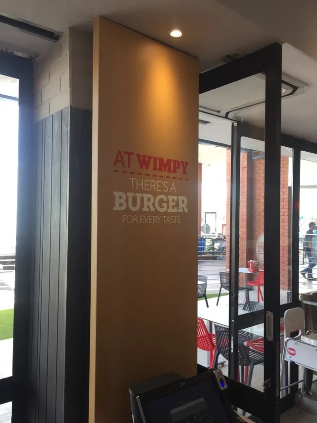 Wimpy — interior signage, photograph 8