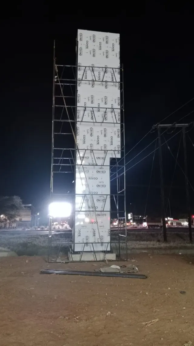 Pylon installation photographed after dark at Palapye