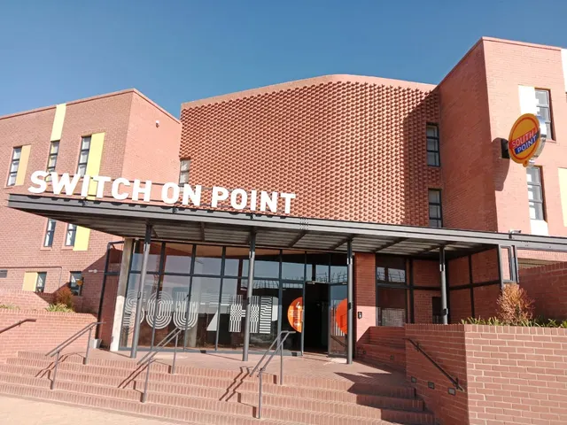Switch On Point shopfront signage in daylight