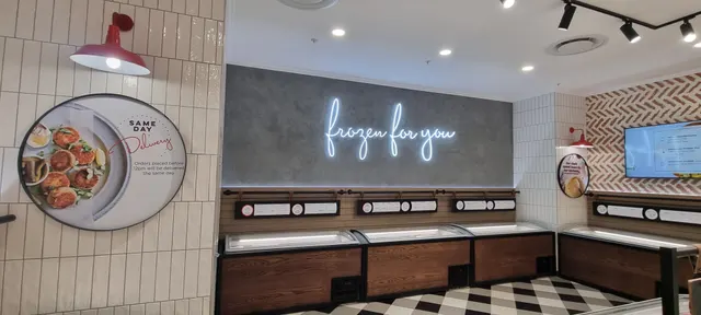 Frozen for You lettering, food graphics and freezer displays at Bedford Centre