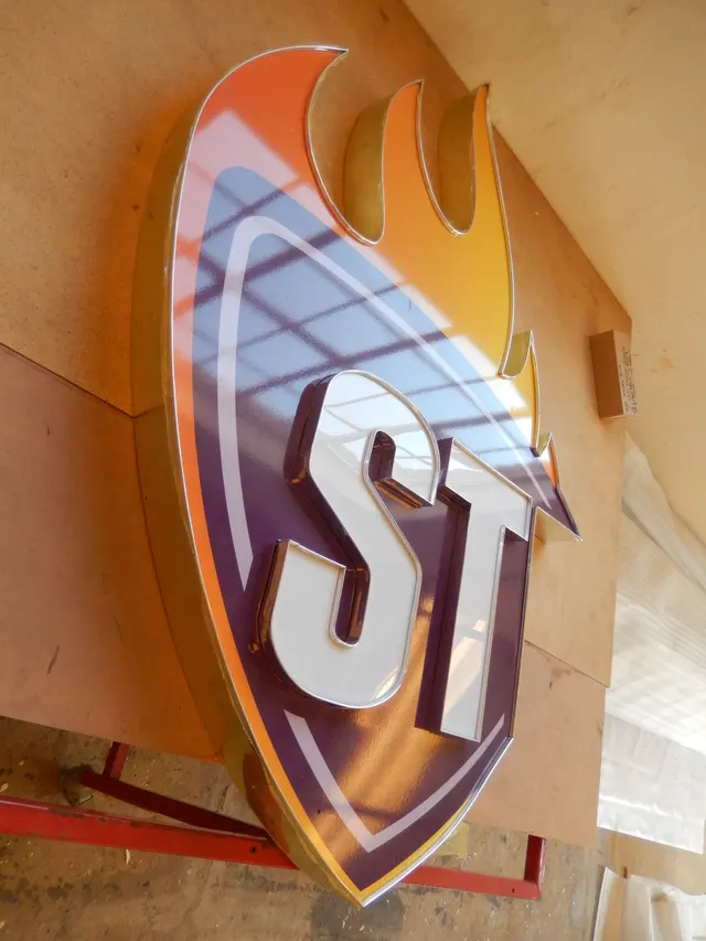 Completed illuminated Steers sign detail in the workshop